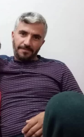 Lastiğini değiştirdiği TIR'ın altında kalıp ölen şoför, toprağa verildi