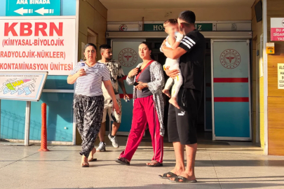 Mangaldaki ateşin üzerine düşen 2 yaşındaki Emral yaralandı